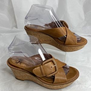 Sofft size 6 1/2 tan leather slip on cork like wedge sandal.